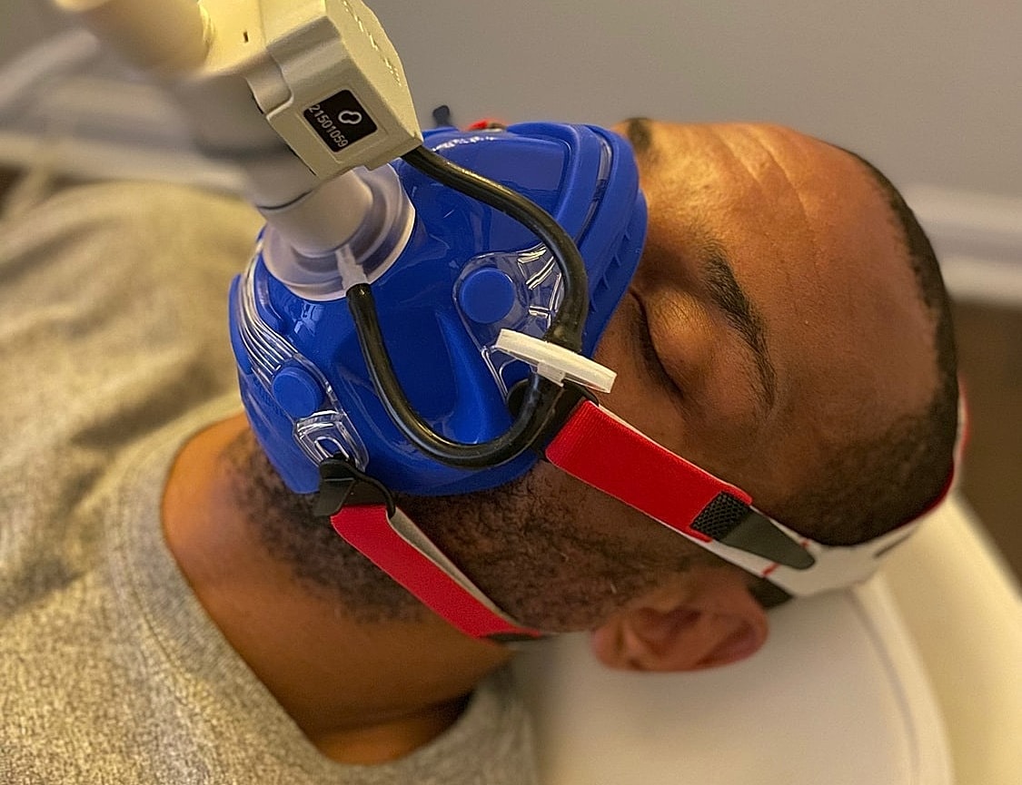 performance medicine ardmore feature - man doing a squat